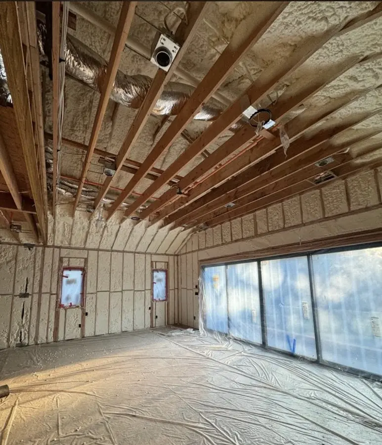 Interior walls and ceiling insulated with spray foam during new construction in Limerick